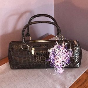 Wine clutch with corkscrew